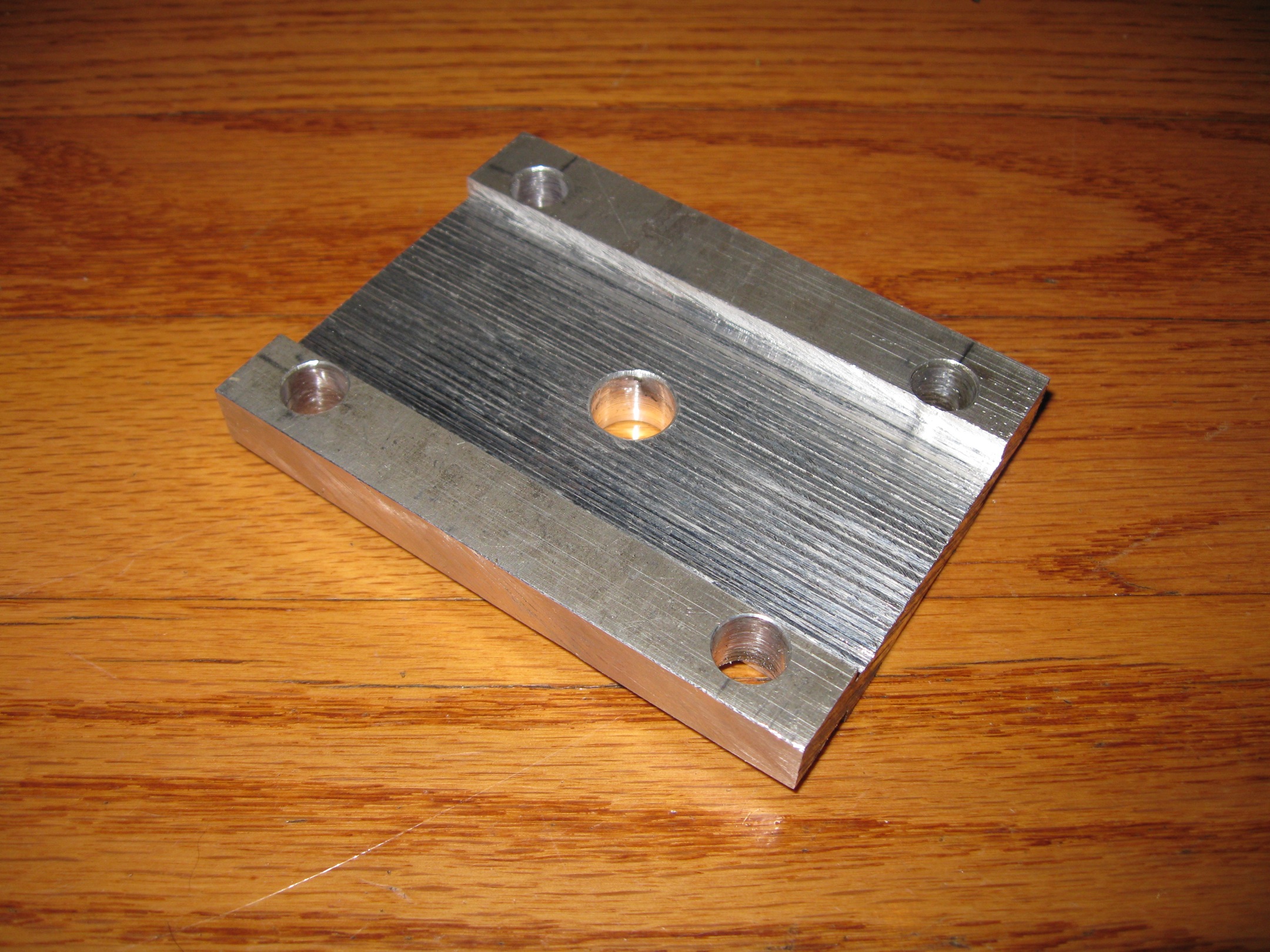 lowering block, aluminum, net 0.46 inches